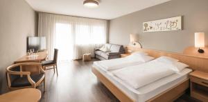 Posteľ alebo postele v izbe v ubytovaní Familienhotel Viktoria
