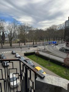a view of a parking lot with cars in a city at Le 21 - Appart 3 chambres - centre de Liège in Liège