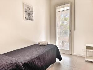 Posteľ alebo postele v izbe v ubytovaní Alghero CHARMING APARTMENTS DOWNTOWN