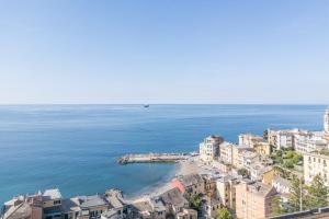 an aerial view of a city and the ocean at Central Design Flat With Parking, Bogliasco in Bogliasco