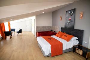 A bed or beds in a room at ZOOM HOTEL