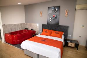A bed or beds in a room at ZOOM HOTEL
