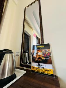 Příslušenství pro přípravu čaje a kávy v ubytování Ambrosia Grand