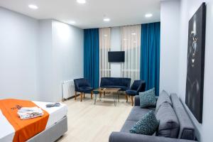 A television and/or entertainment centre at ZOOM HOTEL