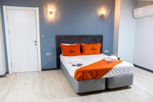 A bed or beds in a room at ZOOM HOTEL