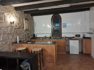Kuchyň nebo kuchyňský kout v ubytování B&B Eguzkitza