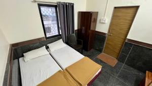 Fotografie z fotogalerie ubytování RajGaurav Lodging v destinaci Kolhápur