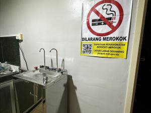 Certifikát, hodnocení, plakát nebo jiný dokument vystavený v ubytování OYO 91150 Hotel Tasik Utama