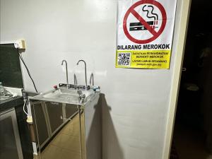 Certifikát, hodnocení, plakát nebo jiný dokument vystavený v ubytování OYO 91150 Hotel Tasik Utama