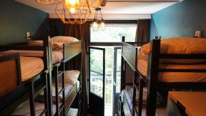 Onefam Amstel客房内的一张或多张床位