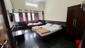 Fotografie z fotogalerie ubytování RajGaurav Lodging v destinaci Kolhápur