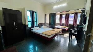 Fotografie z fotogalerie ubytování RajGaurav Lodging v destinaci Kolhápur