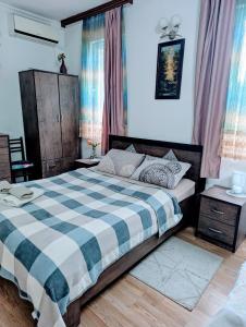 Postel nebo postele na pokoji v ubytování Guest House Marina
