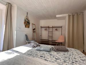 Ένα ή περισσότερα κρεβάτια σε δωμάτιο στο Casa Frida