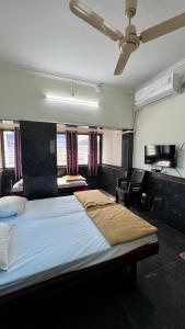 Fotografie z fotogalerie ubytování RajGaurav Lodging v destinaci Kolhápur