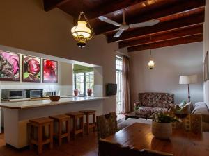 a kitchen and living room with a table and a couch at The Habit Apartments in Worcester
