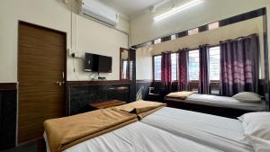Fotografie z fotogalerie ubytování RajGaurav Lodging v destinaci Kolhápur