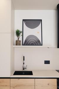 Kuchyň nebo kuchyňský kout v ubytování Apartman K&M + 83 fotografií