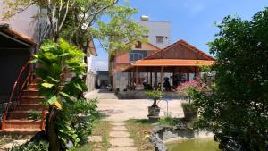 Κήπος έξω από το ML Homestay