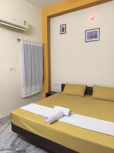 Letto o letti in una camera di hotel kishangarh jaisalmer
