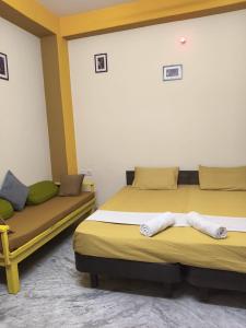 Letto o letti in una camera di hotel kishangarh jaisalmer