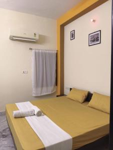 Letto o letti in una camera di hotel kishangarh jaisalmer