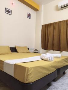 Letto o letti in una camera di hotel kishangarh jaisalmer