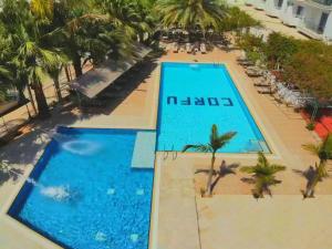 an aerial view of a swimming pool at a hotel at Corfu Hotel in Ayia Napa