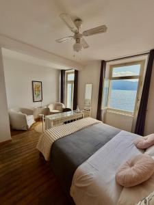 Katil atau katil-katil dalam bilik di Albergo Gargnano