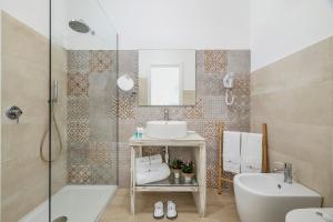 Koupelna v ubytování Hotel Soffio D'Estate