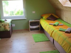Postel nebo postele na pokoji v ubytování Holiday Home Krn&Relax