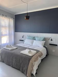 Ένα ή περισσότερα κρεβάτια σε δωμάτιο στο The Hill Top Lodge, 2 Bedroom House +30 φωτογραφίες