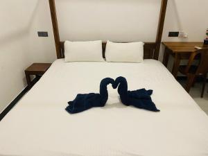 Katil atau katil-katil dalam bilik di Alice Rest Arugambay
