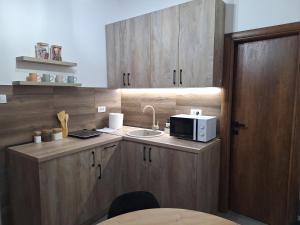 Eldhús eða eldhúskrókur á Apartman S&L