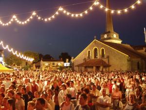 a large group of people standing in front of a church at Résid'Azur in Saint-Jean-de-Monts +143 photos