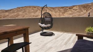 Ein Balkon oder eine Terrasse in der Unterkunft צימר גראפה בערבה - Grappa