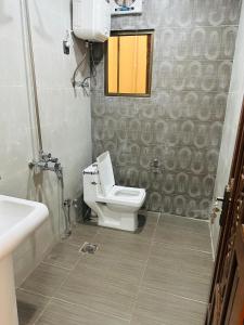 Koupelna v ubytování Cozy 2 bed apartment + 5 fotografií
