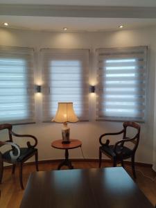 A seating area at ISLAND Time Deluxe Apartment Downtown 3 floors