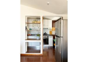 Køkken eller tekøkken på Holihome MENTANA FRN + 26 billeder