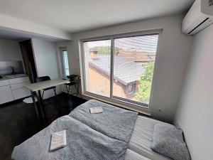 Voodi või voodid majutusasutuse GFS way studios - greenline accomodation toas