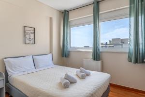 Postel nebo postele na pokoji v ubytování Elvita Apartments 2