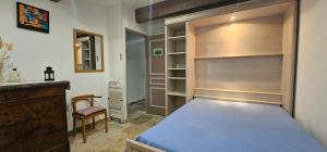 Postel nebo postele na pokoji v ubytování Chambre d'hôtes en Luberon + 10 fotografií