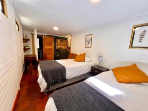 Postel nebo postele na pokoji v ubytování Lodge Colchagua Camp