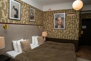 Postel nebo postele na pokoji v ubytování Best Western Plus Grand Hotel