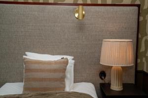 Postel nebo postele na pokoji v ubytování Best Western Plus Grand Hotel