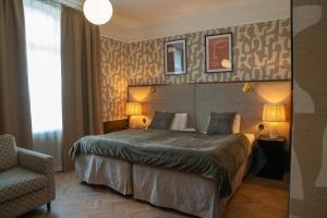 Postel nebo postele na pokoji v ubytování Best Western Plus Grand Hotel