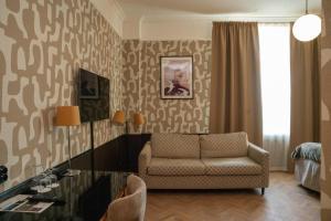 Posezení v ubytování Best Western Plus Grand Hotel