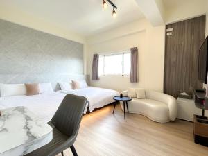 Een bed of bedden in een kamer bij 沙沙民宿