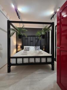 Postel nebo postele na pokoji v ubytování XoXo Apartments Tampere