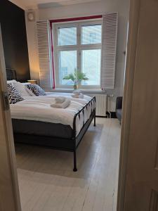 Postel nebo postele na pokoji v ubytování XoXo Apartments Tampere